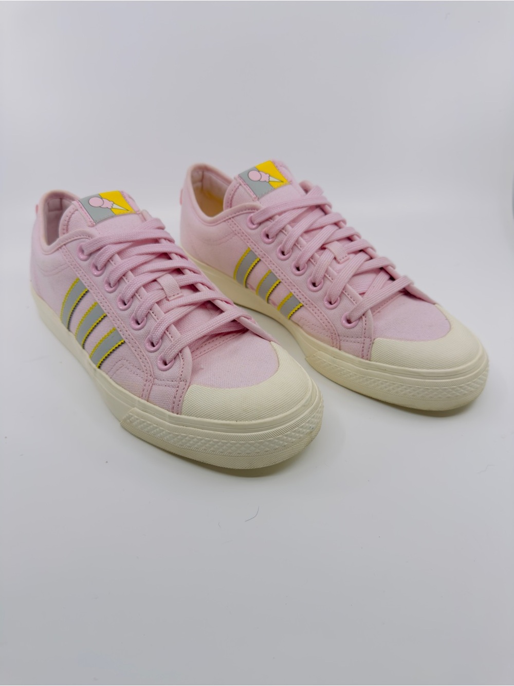 Adidas Originals Nizza Low sneakers color pink and cream white, yellow, and grey